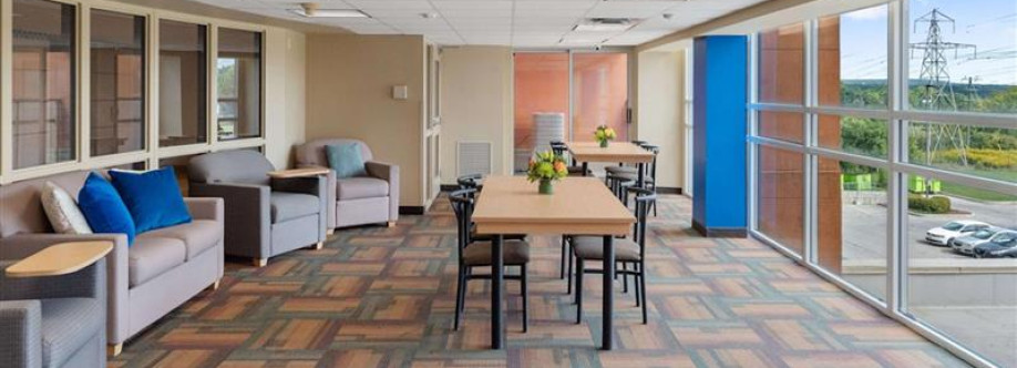 West Village Suites Cover Image